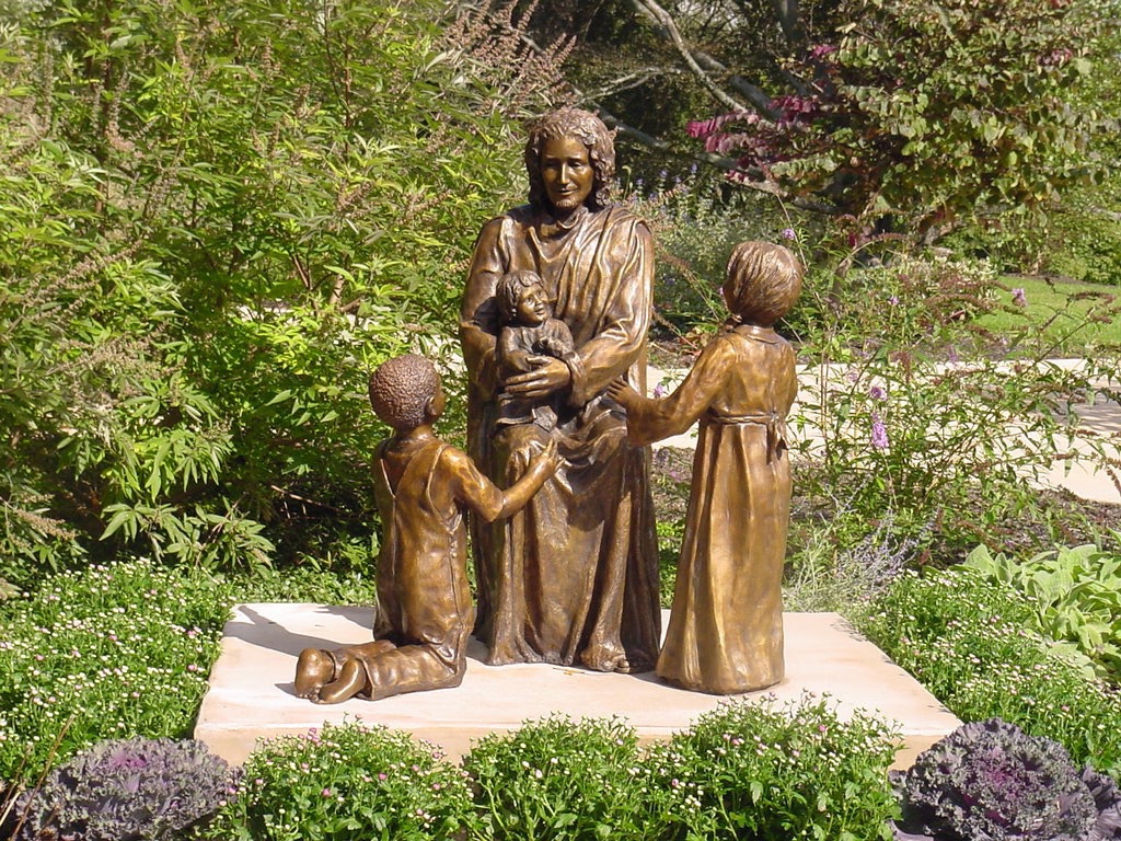 Bronze sculpture of Jesus and the Kids